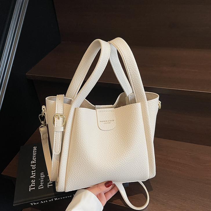 Comercio exterior ocio retro bolso de cubo de mano 2025 nuevo versátil simple bolso de hombro de alta calidad textura mochila