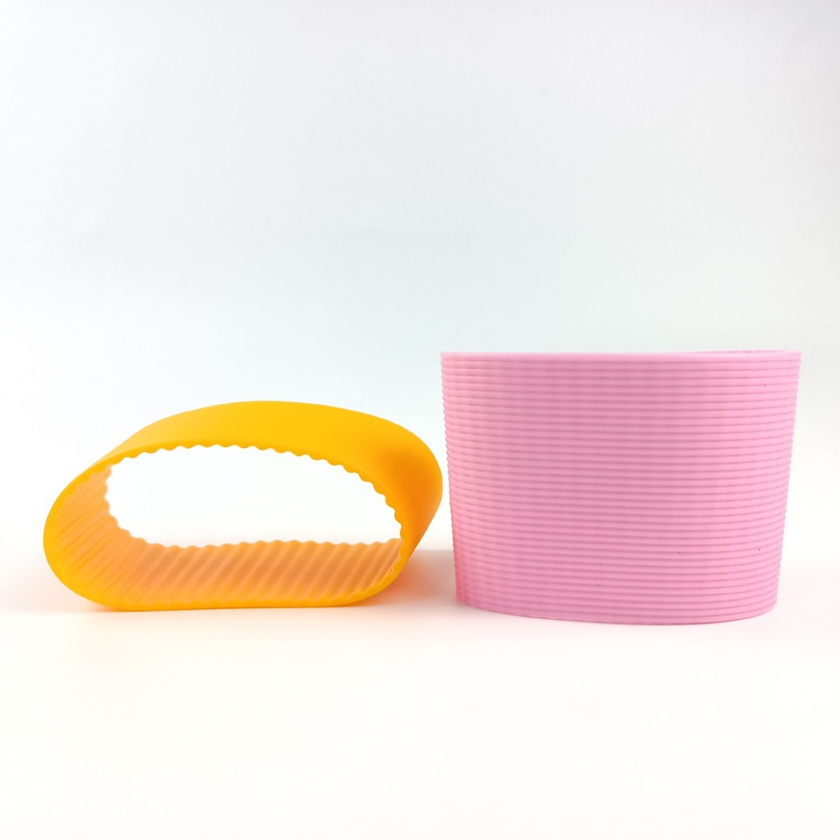 源头实力厂家批发8*7*6CM外横内竖厚短隔热不烫手陶瓷硅胶杯套