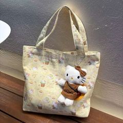 新商品の漫画のハンドバッグの高颜値の手はキャンバスのカバンを持っています。