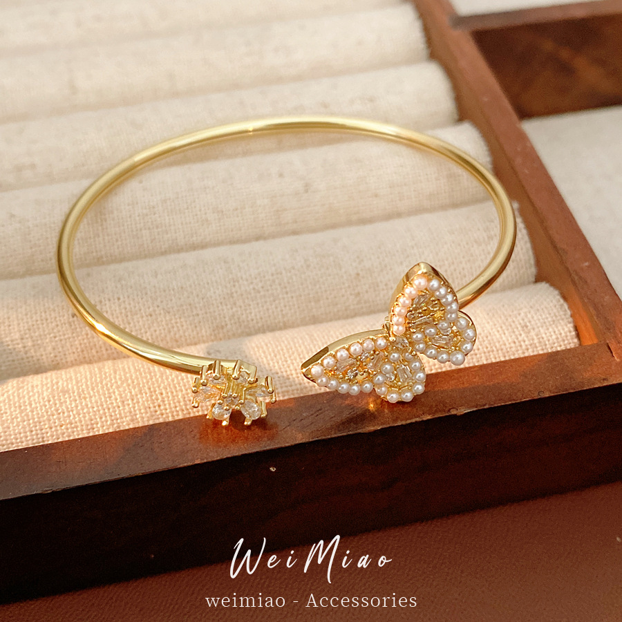 Flores de zircon mariposa abertura pulsera de perlas temperamento exquisito pulsera de moda versátil lujo ligero nicho joyería al por mayor