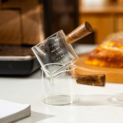 木の柄のコーヒーの簡単なミルクの缶のミルクの杯の高ホウ素のシリコンのガラスのコーヒーのカップのコーヒーの用具の抽出の目盛りの計量カップのミルクの缶