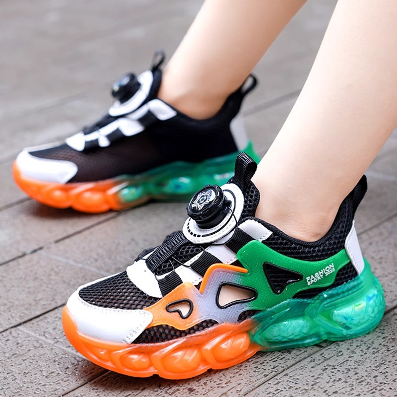 Sandalias para niños Jinjiang 2025 verano nuevos zapatos deportivos para niños de una sola red zapatos transpirables de malla para niños de mediana edad