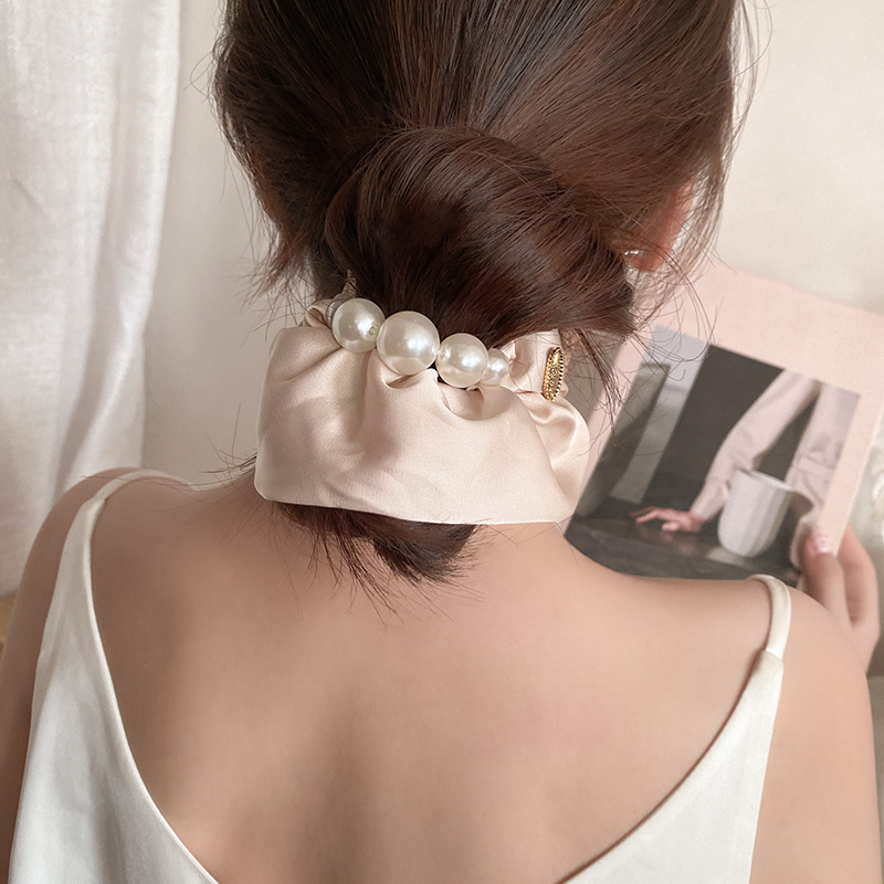 Estilo francés Hepburn perla intestino grueso anillo para el cabello temperamento femenino bola baja cuerda para el cabello retro pequeña fragancia cuerda para el cabello atado