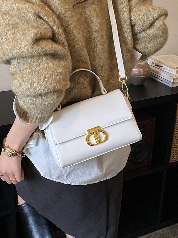 Hong Kong estilo retro bolso de mano de alto nivel, bolso de hombro de nicho retro, simple y versátil, bolso de lujo ligero y de moda.