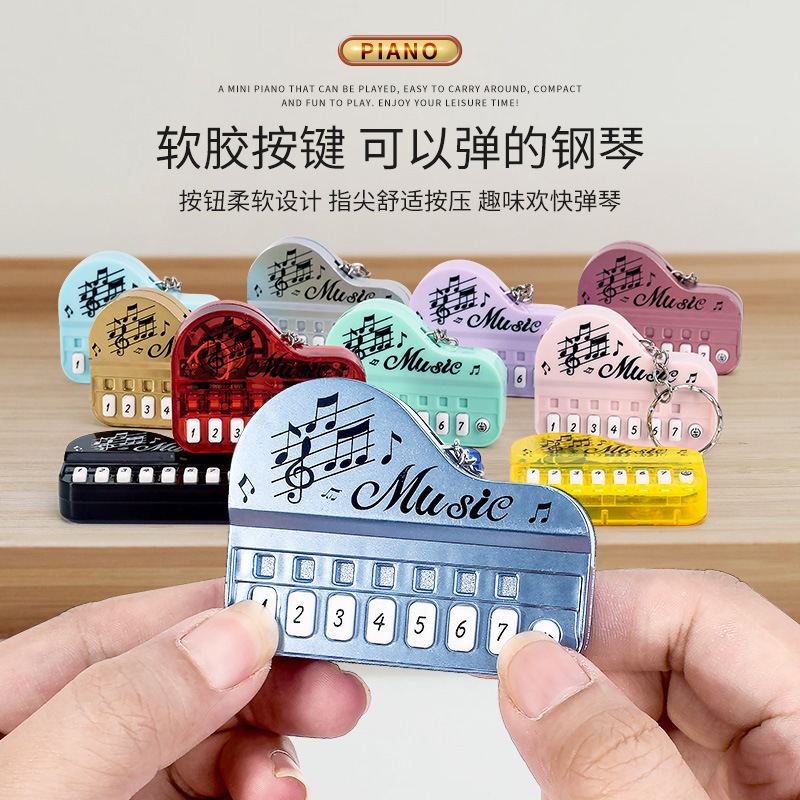 Creative electronic luminous performance handheld small game pendant mini piano keychain electronic organ toy wholesale