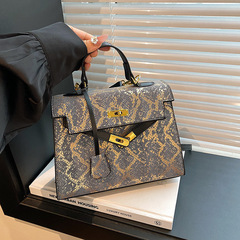 クロスボーダー女性カバンhandbags2025新型欧米ファッションレトロ蛇紋手提げ片肩斜めショルダー凱麗カバン