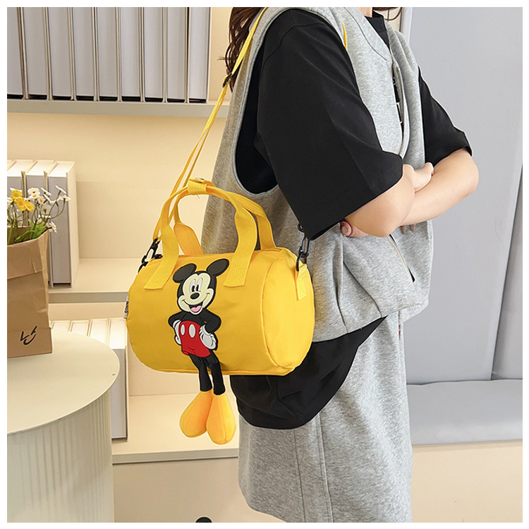 The 2021 new children's bags feature a cute Mickey Mouse pattern bowling bag for girls and a fashionable hand-held shoulder bag undefined