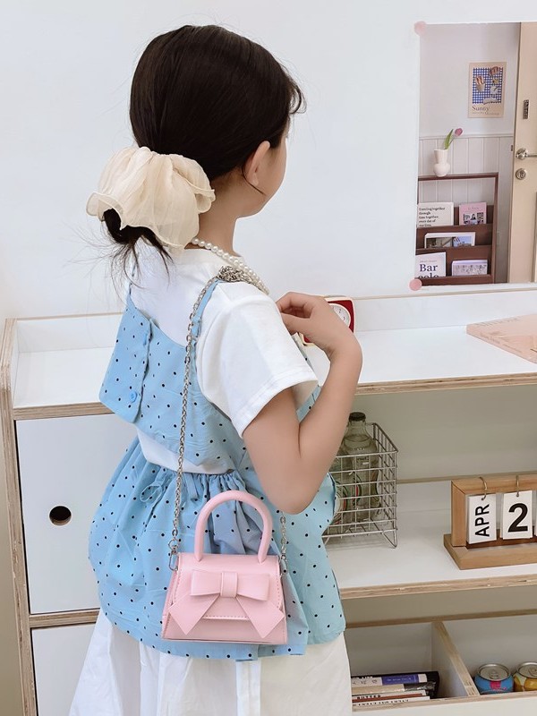 Bolso de mujer 2025 tendencia de primavera nuevo arco de moda para niños bolso de hombro de estilo extranjero bolso de mano