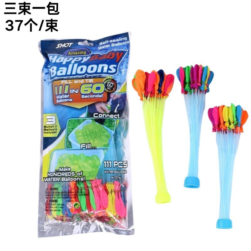 Feria del templo de globos al por mayor, los niños disparan globos pequeños, globos pequeños, globos redondos de agua, empujando los puestos del mercado nocturno
