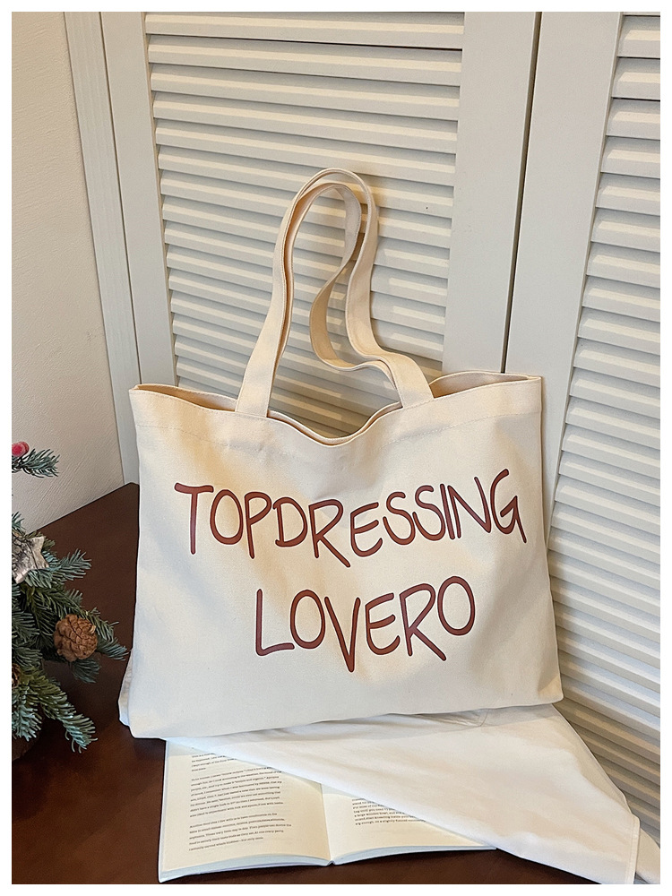 Bolsas coreanas de gran capacidad para mujeres 2026 nuevas letras de impresión de moda bolsas axilales de hombro para viajar bolsas de ocio