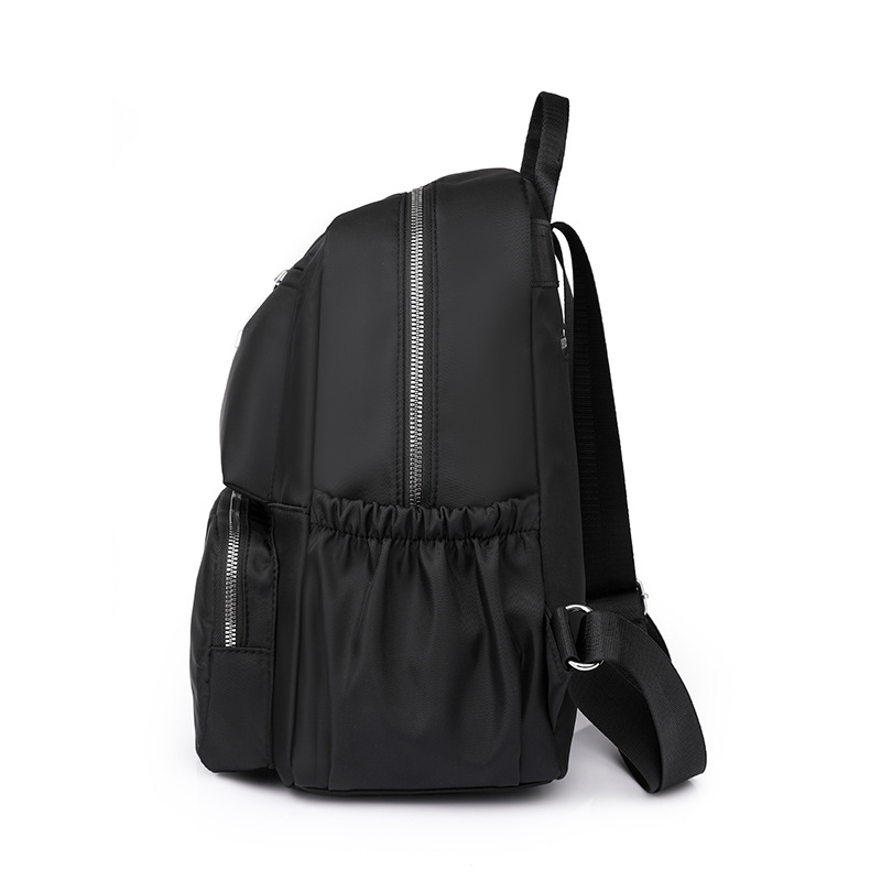 2023 nueva mochila de tela Oxford para mujer casual, color sólido simple, gran capacidad, mochila plegable ligera, mochila escolar de moda