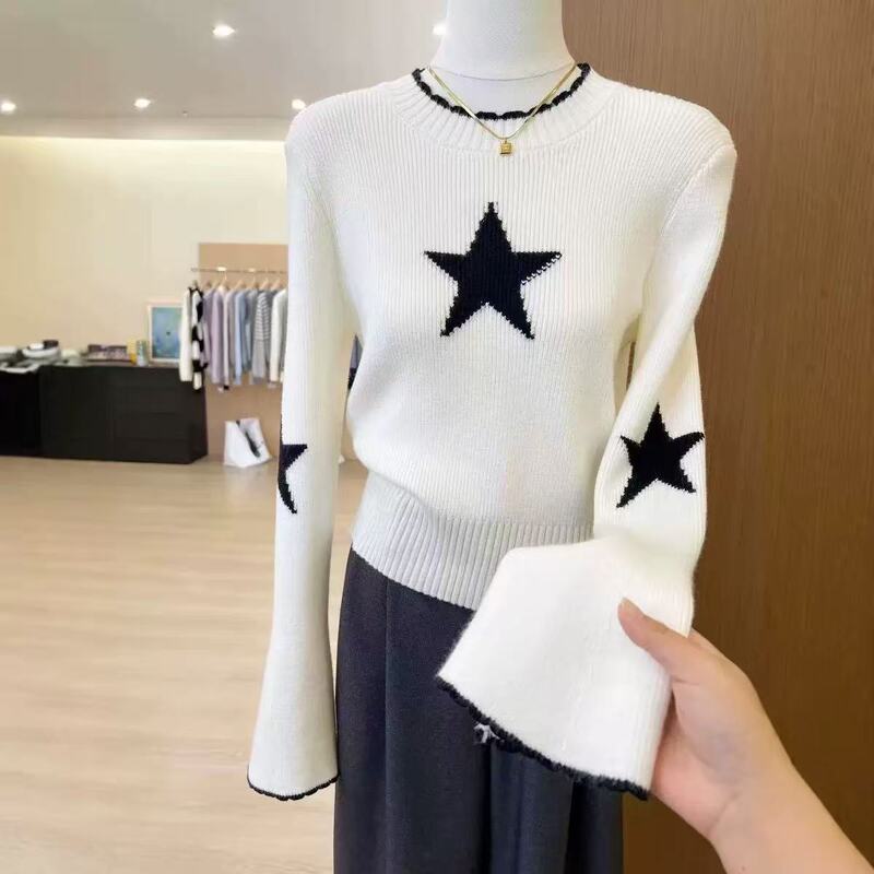 Gentle style black and white star jacquard knit sweater for women, autumn niche design with contrasting colors, trimmed waist, short length, slimming and versatile Gentle style black and white star jacquard knit sweater for women, autumn niche design with contrasting colors, trimmed waist, short length, slimming and versatile