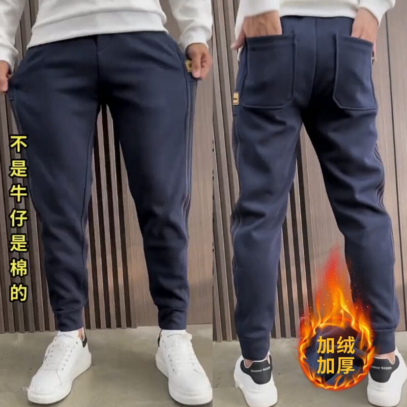 男性用カジュアルパンツ春秋衛ズボンにはゆったりとした足の束があります。|undefined