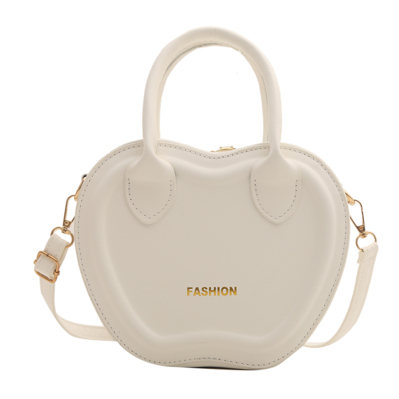 Bolso de mujer 2024 verano nuevo bolso de moda empujada textura PU bolso de hombro simple color sólido mochila de viaje