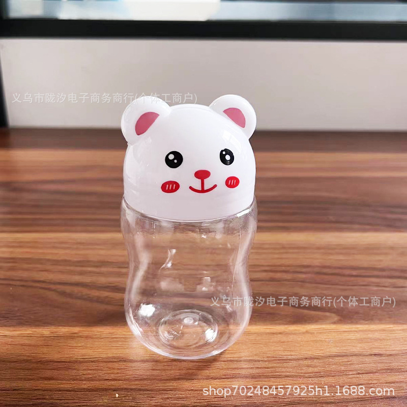 Oso de dibujos animados botella plástico transparente PET grado alimenticio caramelo soluble frijol puede parada mercado nocturno al por mayor color arcilla sellada con tapa