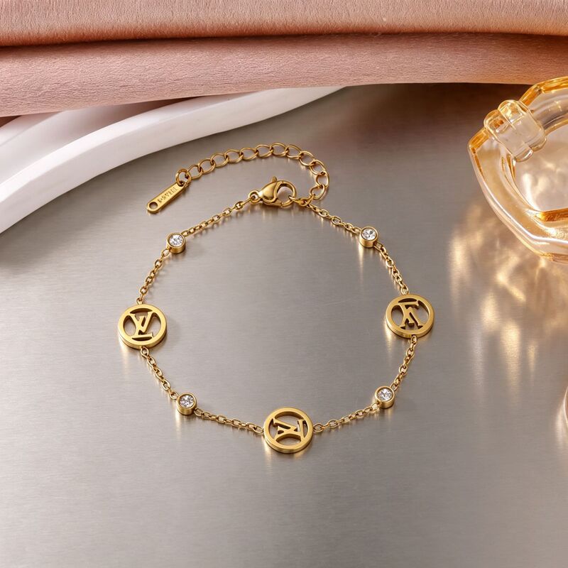 European and American style round hollow LV letter bracelet for women, stainless steel gold-plated with inlaid stones, fine chain, light luxury versatile wristband