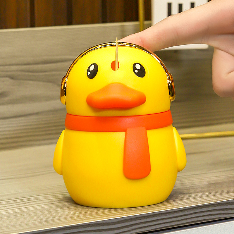 Creativo de dibujos animados lindo moda pequeño pato amarillo de alta gama luz de lujo palillo de dientes puede presionar la señal emergente automática para el hogar