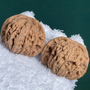 Apple orchard four buildings lion head Wen play walnut wholesale Kirin pattern tiger head pattern official cap walnut 35-45mm