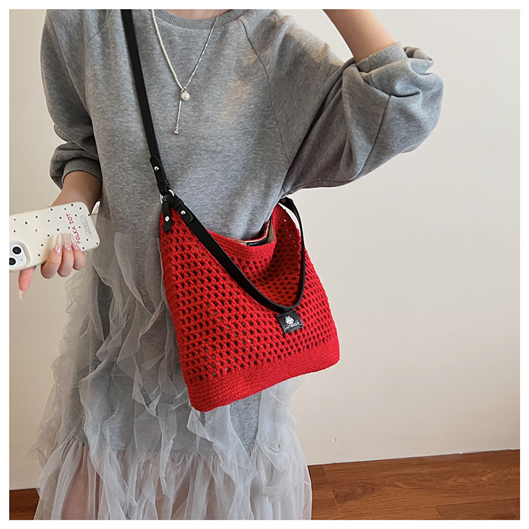 Summer hollowed-out knitted underarm bag for women, 2025 new style, laid-back and relaxed, seaside vacation style single-shoulder crossbody bag undefined