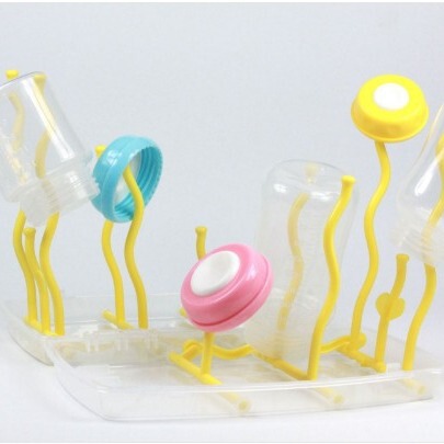 Nursery bottle rack with five color options (pink, yellow, blue, green, orange)