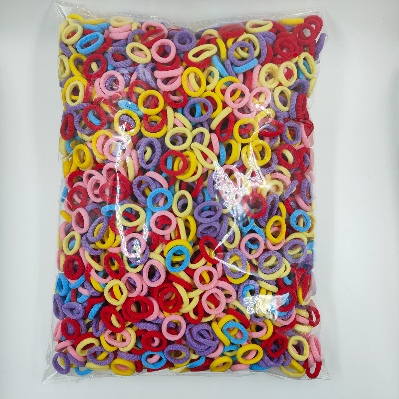 Fábrica directa sin costuras de alta elasticidad cuerda de cabeza para niños anillo de toallas OPP2000 anillo de cabello de cabello para bebés al por mayor