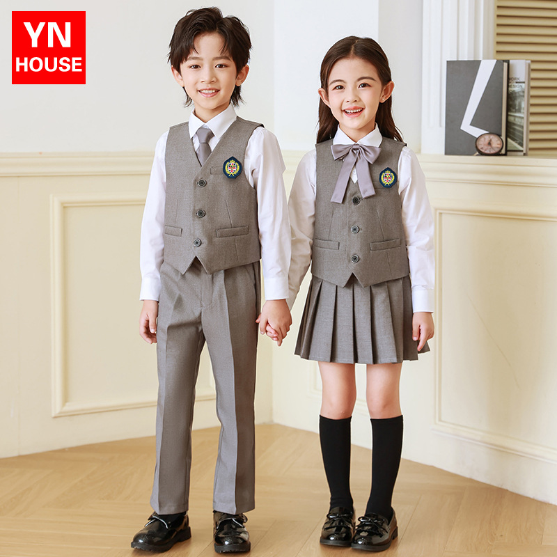 Ropa de jardín de infancia Primavera y otoño estilo británico traje vestido de primer grado ropa de cuatro piezas de escuela primaria uniforme traje