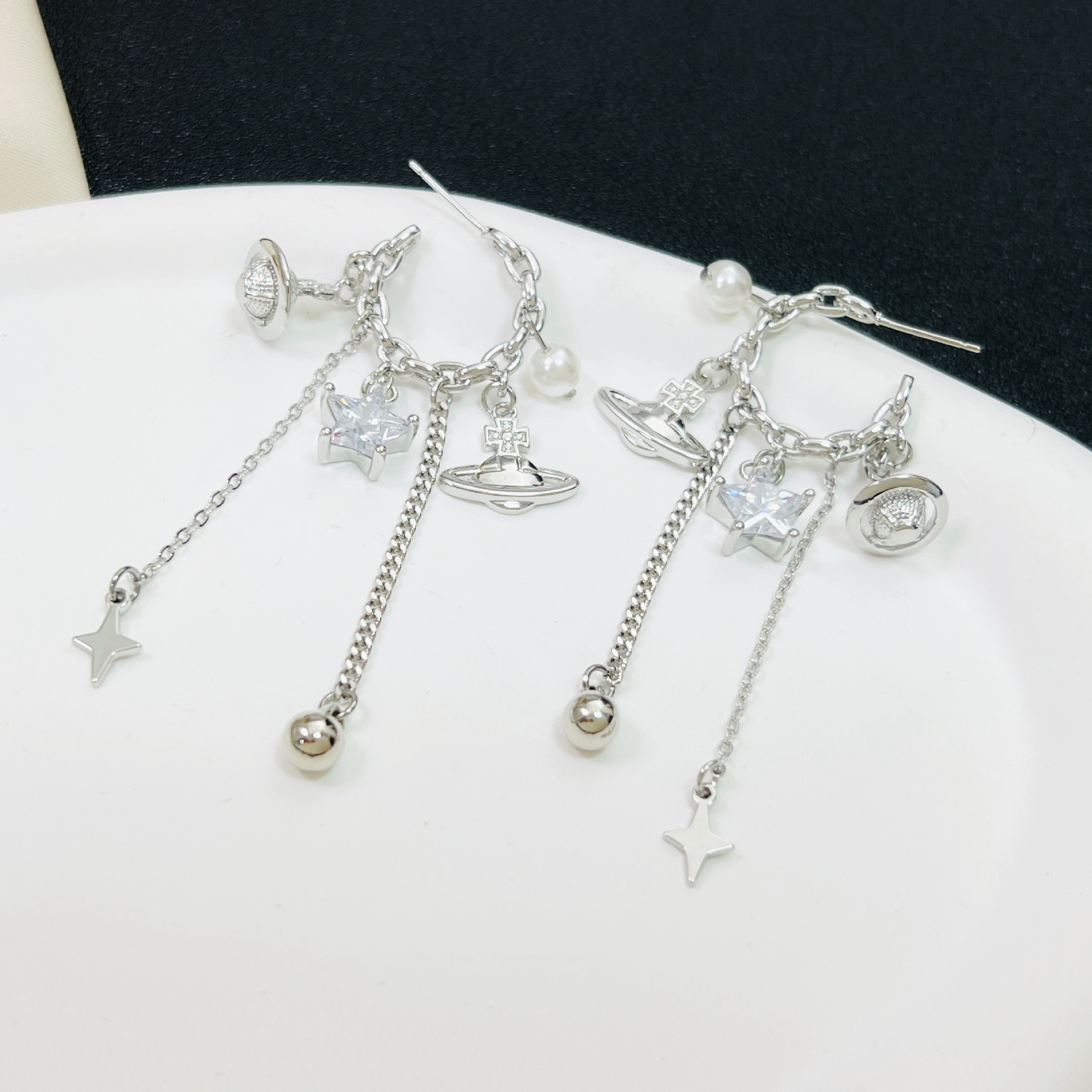 Earrings with zircon pearl
