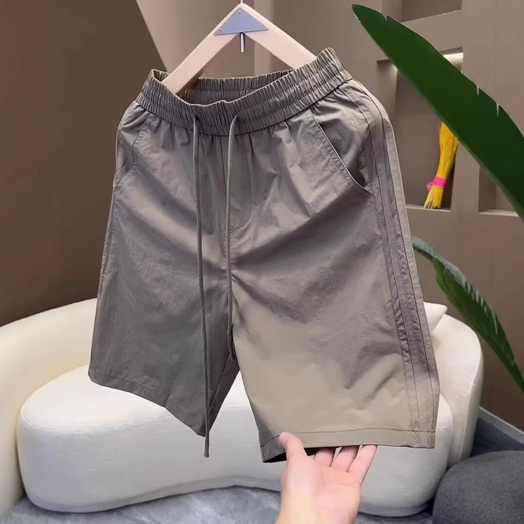 Pantalones cortos transpirables de verano de alta calidad, moda masculina, juveniles, pantalones casuales sueltos.