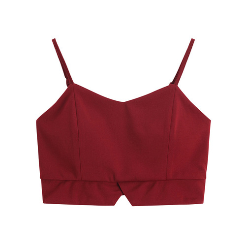 Women's black spaghetti strap backless camisole short sleeve top, with removable cups, versatile for wearing over or under a blazer, highlighting the collarbone and back.