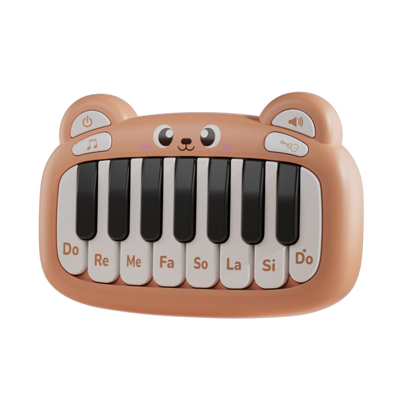Cartoon Pocket Electronic Instruments Juguetes para niños Teclado mini luminoso Piano con altavoces de muñeca