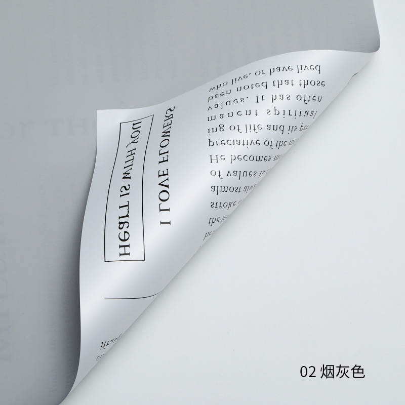 Fábrica de fiestas de flores al por mayor periódico inglés transfronterizo flor de embalaje de flores impermeable doble cara flor de embalaje flor de papel