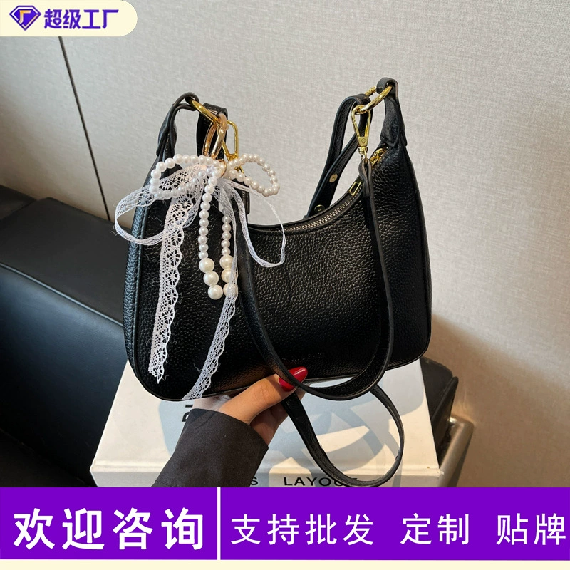 Иностранная сумка женская сумка 2025 новый нишевой дизайн модный простой сумка на плечо повседневная дикая ручная сумка