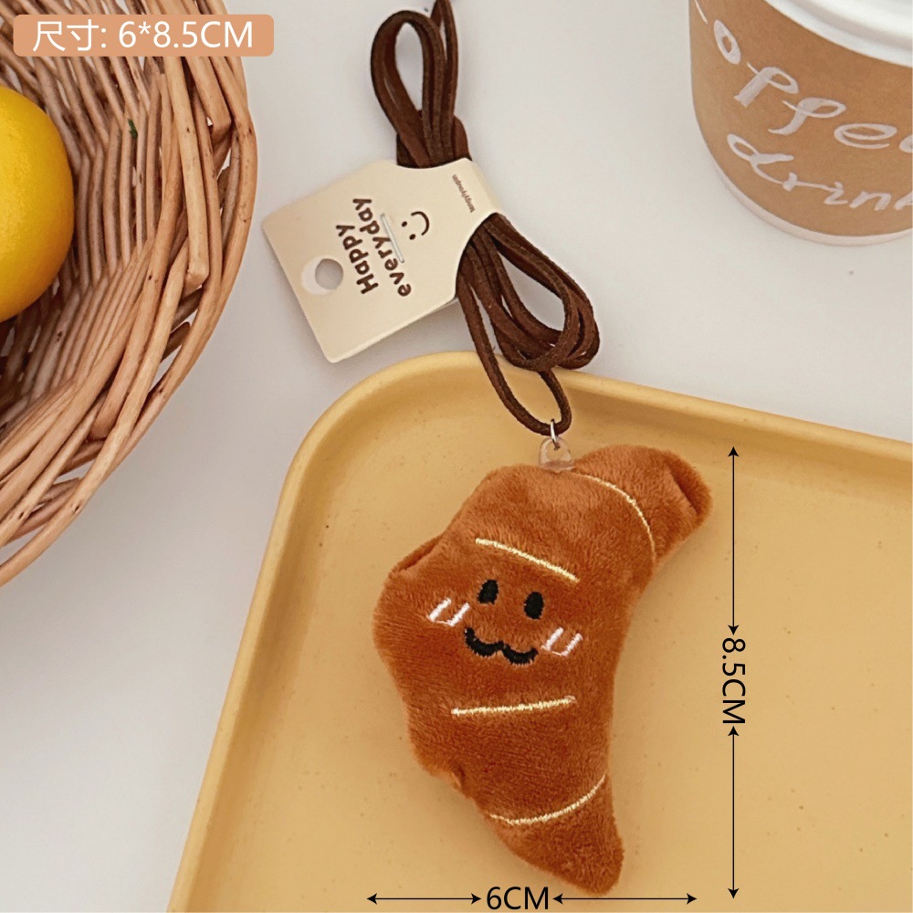 Divertido pan de peluche colgante muñeca lindo extraño mochila colgante de coche accesorios de muñeca al por mayor