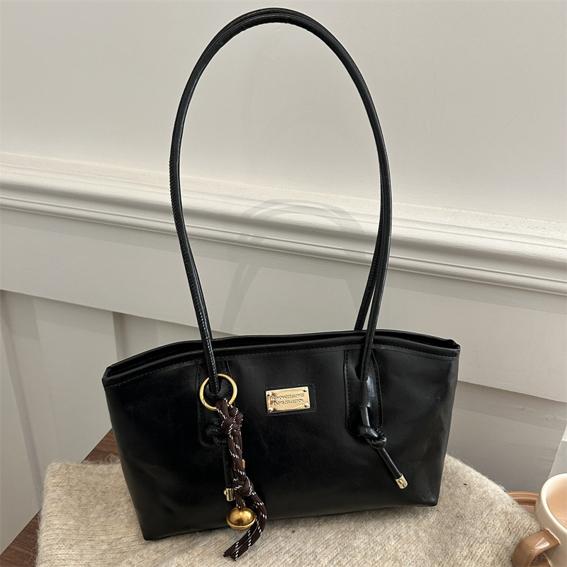 Bagos retro extranjeros para mujeres 2024 nueva moda cera petot bolso de otoño y invierno popular bolsa de hombro de viaje