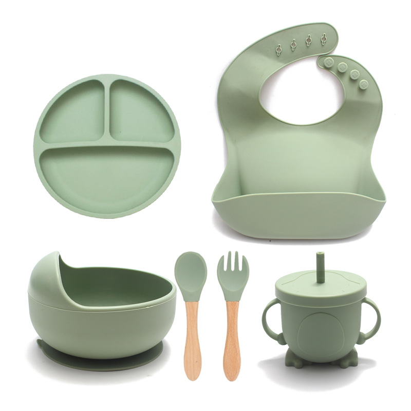 Plato de cena transfronterizo de silicona con ventosa, cuenco de comida integrado, vajilla dividida para bebé resistente a altas temperaturas, juego de ocho piezas al por mayor