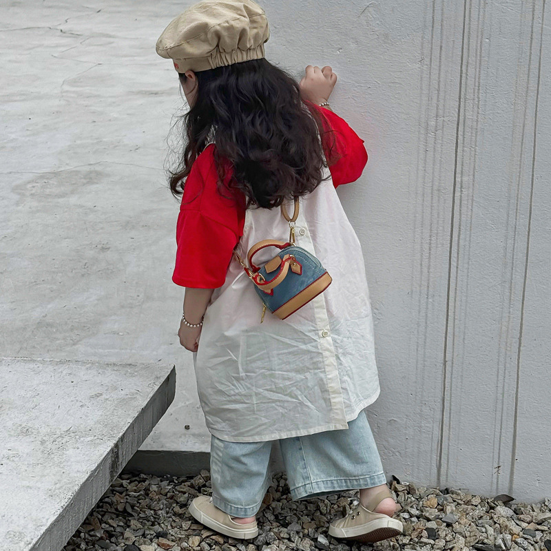 Bolsos de hombro coreanos para niños y niñas, bolsas de estilo de color extranjero, mini bolsas de conchas para niños, 2024 nuevas bolsas de comercio exterior para niños