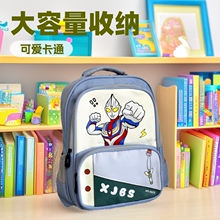 可爱卡通新款学前班一年级书包臭特曼印花双肩包男女孩大容量背包