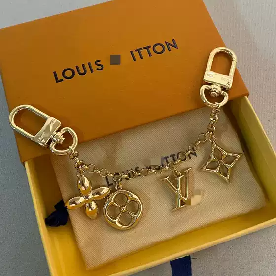 L Brand New Foreign Trade Keychain Four-Leaf Clover Alloy Charm European and American Fashion Trend Bracelet Bag Chain L