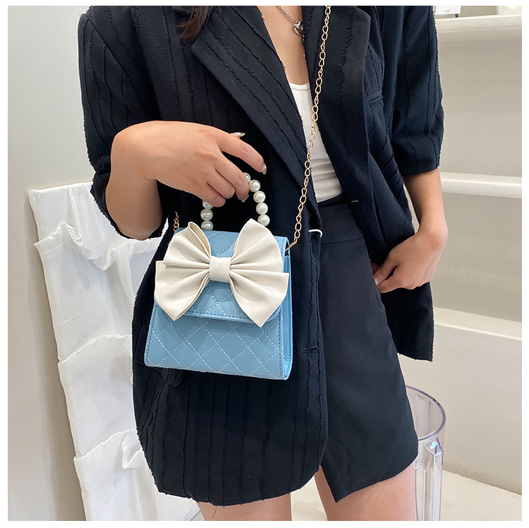 Nihaojewelry Retro Rhombus Chain Bow Pearl Messenger Handbag Wholesale display picture 17