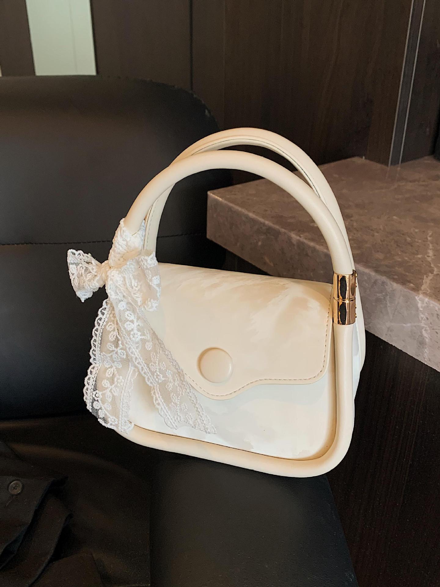 Bolso cuadrado pequeño de mano de estilo occidental de moda para mujer 2025 nuevo bolso de hombro casual de todo fósforo bolso de mensajero de alta calidad transfronterizo
