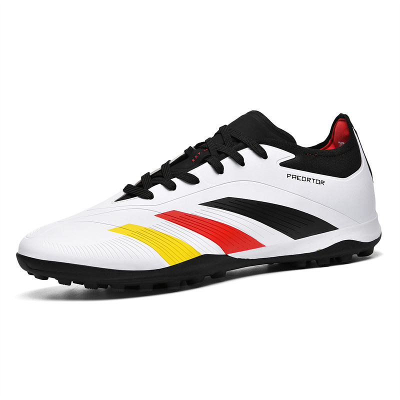 Spot cross-border Putian sin costuras zapatos de fútbol Messi zapatos deportivos de entrenamiento de uñas largas para jóvenes de corte bajo para hombres