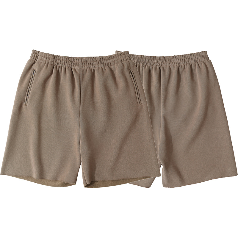 Alta versión YEEZY Kanye desgaste mismo estilo color sólido fleece-forrado High Street angustiado deshilachado pantalones cortos deportivos