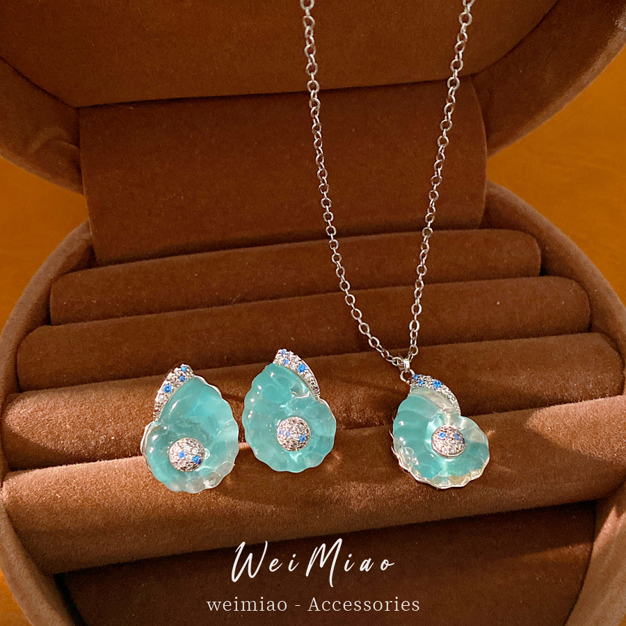 Agujas de plata de resina de piedra de silicio de caracol auriculares accesorios de vacaciones de mar pendientes de lujo ligero conjunto de joyería de alta calidad al por mayor