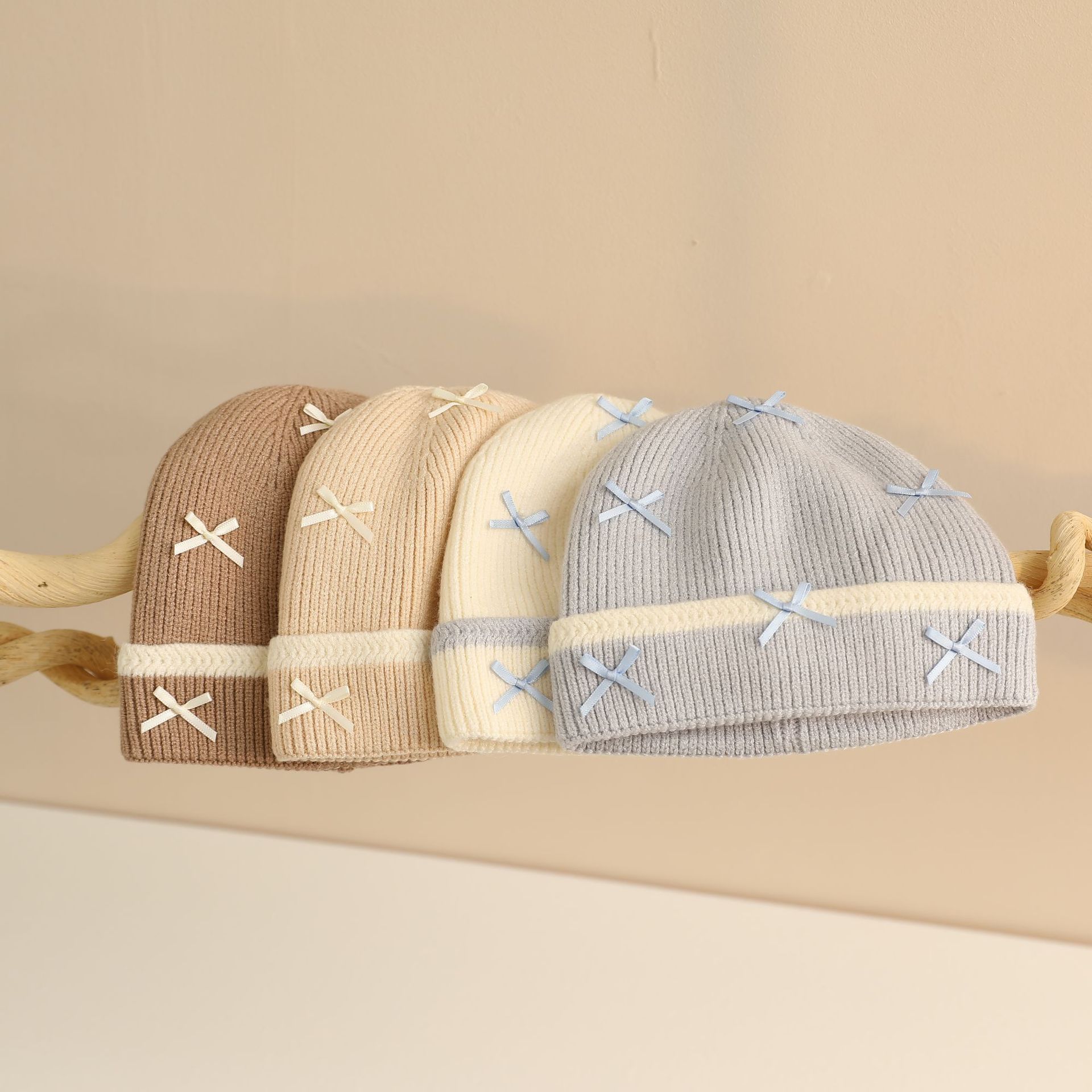 ¡Eso es dulce! Sombreros de alambre de punto de arco para niñas otoño y invierno innings dulces y gruesos nuevos sombreros fríos cálidos