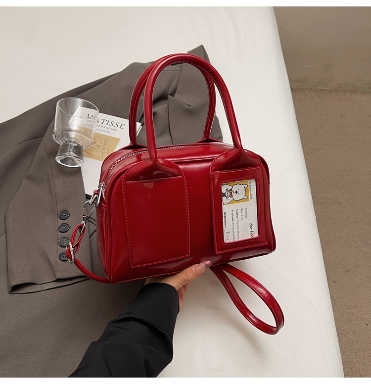 Bolso cuadrado pequeño portátil de niña linda en la mano 2025 nuevo bolso de mensajero de un solo hombro de moda coreana bolso femenino de alta gama