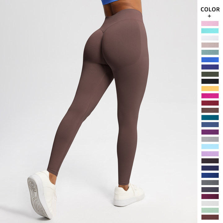 Cross-border Europe and the United States peach seamless solid color three waist hip high waist yoga clothing sports running fitness yoga pants women Cross-border Europe and the United States peach seamless solid color three waist hip high waist yoga clothing sports running fitness yoga pants women