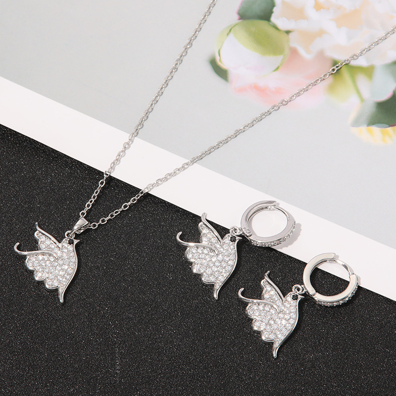 Corea del Sur Dongdaemun cobre con incrustaciones de circón collar pendientes de la joyería traje elegante del todo-fósforo pendientes collar al por mayor
