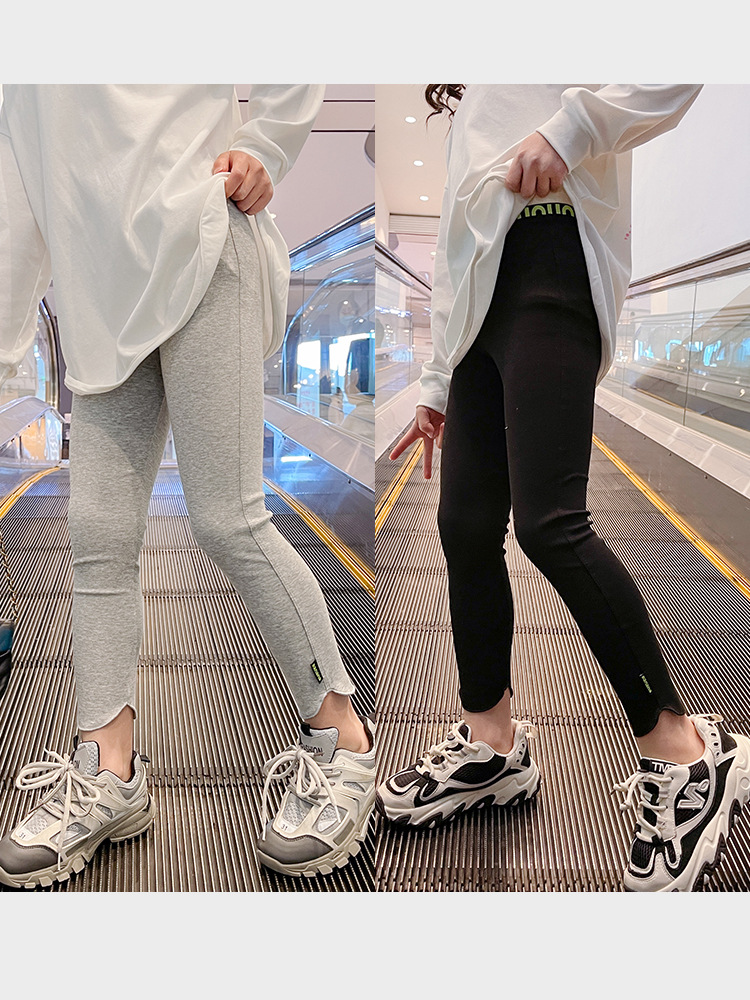 Polainas de las niñas de primavera y otoño nuevas niñas medias y grandes niños pantalones de todo fósforo ropa exterior de moda Pantalones de los niños de moda