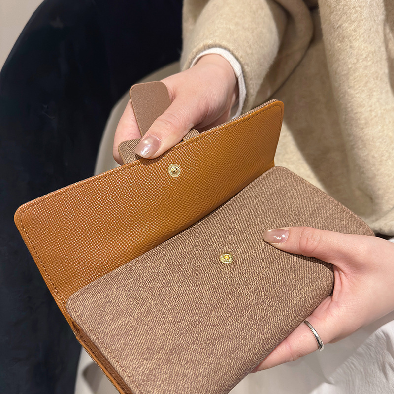 New Long-Style Women's Portable Storage Wallet with Large Capacity, High-End Fashion Wallet with Multiple Card Slots and 70% off Snap Buttons New Long-Style Women's Portable Storage Wallet with Large Capacity, High-End Fashion Wallet with Multiple Card Slots and 70% off Snap Buttons