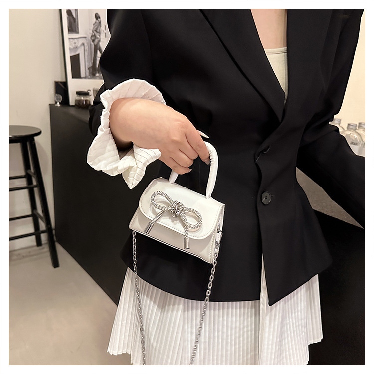 Ins niche French textured bag female 2024 new bow small square bag stylish shoulder messenger bag_voghion.com